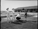 Golf instructor and swimming pool at Ocean Shores Resort, 6/12/1960, #36993_1