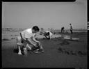 Razor clam digging off Ocean Shores Resort, 6/12/1960, #36999_1