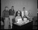 GOP headquarters group with Nixon literature, 8/5/1960, #37440_1