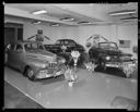 Huffman Motors showroom with bouquets, 8/15/1946, #22626_1