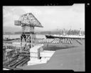 Ship SEA MYSTERY with lumber stockpile, 8/22/1952, #26793_1