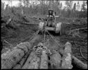 Rubber tired arch skidding logs at Anderson & Middleton log camp, 8/14/1956, #31381_1