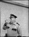 Police officer with 2-way radio, 9/12/1962, #42099_1