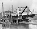 Port dock grid with dredge ROBERT GRAY at low water  -3.3