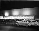 Harbor Hardware store opening at night, exterior, 10/15/1953, #27713_1