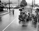 Upset shingle truck at Lincoln St. and Perry, 10/11/1955, #30042_1