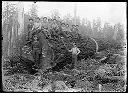 Polson Logging Co. yarding crew with log, 9' - 10