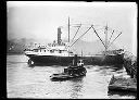 Tug FORRESTER and steamship at dock, circa 1905, #G0097_1