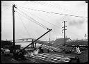 Moving lumber with loading boom, circa 1910, #G0113_1