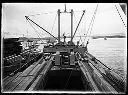 Loading ship with big timbers, circa 1922, #G0290_1