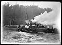 Ship CITY OF NOME on fire near Red Crown Gasoline storage, tugs TYEE and RANGER, 6/3/1927, #G0401_1