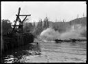 Log dump with steam engine, circa 1910, #G0429_1