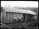 Loggers and camp building, circa 1910, #G0552_1