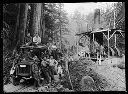 Loggers with donkey engine, child, U.S. Army truck, officers and soldiers, circa 1915, #G0570_1