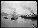 VIGILANT and tug JOHN CUDAHY approach the Donovan Lumber Co. pier, circa 1926, #G0599_1