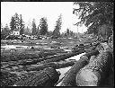 House by log pond, circa 1920, #G0607_1