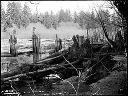 Log pond with pilings, circa 1920, #G0619_1