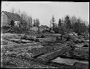 Buildings overlooking log pond, circa 1915, #G0664_1