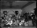 Large group in costume with Welcome sign, circa 1907, #G0712_1