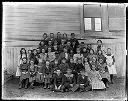 Woman and group of children, school portrait?, circa 1907, #G0718_1