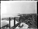 Bird's eye waterfront view with mill and lumber, circa 1920, #G0747_1