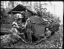 Loggers and donkey engine with cable and skidder tongs, circa 1907, #G0760_1