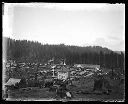 Bird's eye view of town with flag and Pacific Lumber Co., circa 1920, #G0778_1