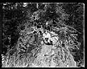 Group of hikers in forest, probably Olympic Mountains, circa 1925, #G0934_1