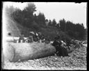 Group picnicking on the beach , circa 1907, #G0983_1