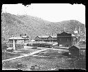 View of town with steam locomotive and passenger cars, circa 1907, #G0991_1