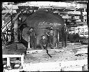 Four men in sawmill with log 105 inches diameter, circa 1907, #G1021_1