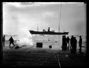 U.S. Coast Guard fires Lyle gun to send rescue line to TENPAISAN MARU, 11/24/1927, #G1136_1