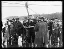 Crowd with TENPAISAN MARU aground, breeches buoy is adjusted, 11/24/1927, #G1145_1