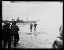 Crowd watches breeches buoy rescue of TENPAISAN MARU crew, 11/24/1927, #G1150_1