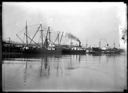 Ships and barges loading lumber, includes OLYMPIC, circa 1922, #G0318_1