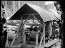 Three loggers with donkey engine and cable reels, circa 1915, #G0649_1