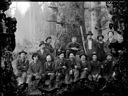 Group of loggers with saw and dog, circa 1907, #G0669_1