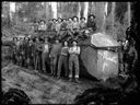 Group of loggers with big log, circa 1907, #G0670_1