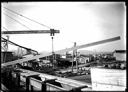 Hoisting timbers at lumber yard, circa 1922, #G1244_1