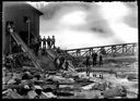 Men near sawmill and log pond, circa 1907, #G1259_1