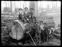 Loggers seated on log, circa 1910, #G1419_1