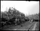 Loggers seated on log train, Camp 2, Polson Logging Co., circa 1915, #G1420_1