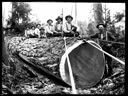 Loggers seated on log, circa 1910, #G1424_1