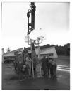 Volunteer crew installing basketball hoop at Emerson School, 11/24/1967, #53057_1