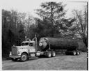 Man with Ramsey Contract Logging truck, possibly Doug Woodring, 5/1972, #59618_1