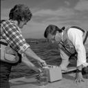 Workers with water sample, 8/1985, #69484_2