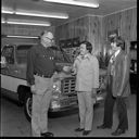 Sam Ramsek selling new truck to Mayor Walt Failor at Ramsek Chevrolet, circa 1975, #62426_1