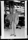 W. T. Brust in front of machinery at factory startup, circa 1934, #66074_6