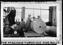 Men in caps in factory with roll of paper, at factory startup, circa 1934, #66074_7