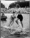 Two women log rolling, 7/1981, #67086_2